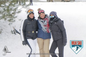 MLK Ski Weekend 2016 group photo of 3 ladies posing outside in winter gear doing ski activities
