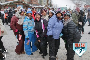 MLK Ski Weekend 2016 ladies group photo in the village during day party