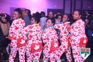 MLK Ski Weekend 2018 pajama party and girls wear Canada onsie at themed party